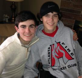 Best friends: Joey O'Leary and Mark Delamere are organizing a street hockey tournament to help Kevin Cellucci. All three were injured in a horrendous car crash on the Arborway last September. Photo courtesy Sheila Delamere